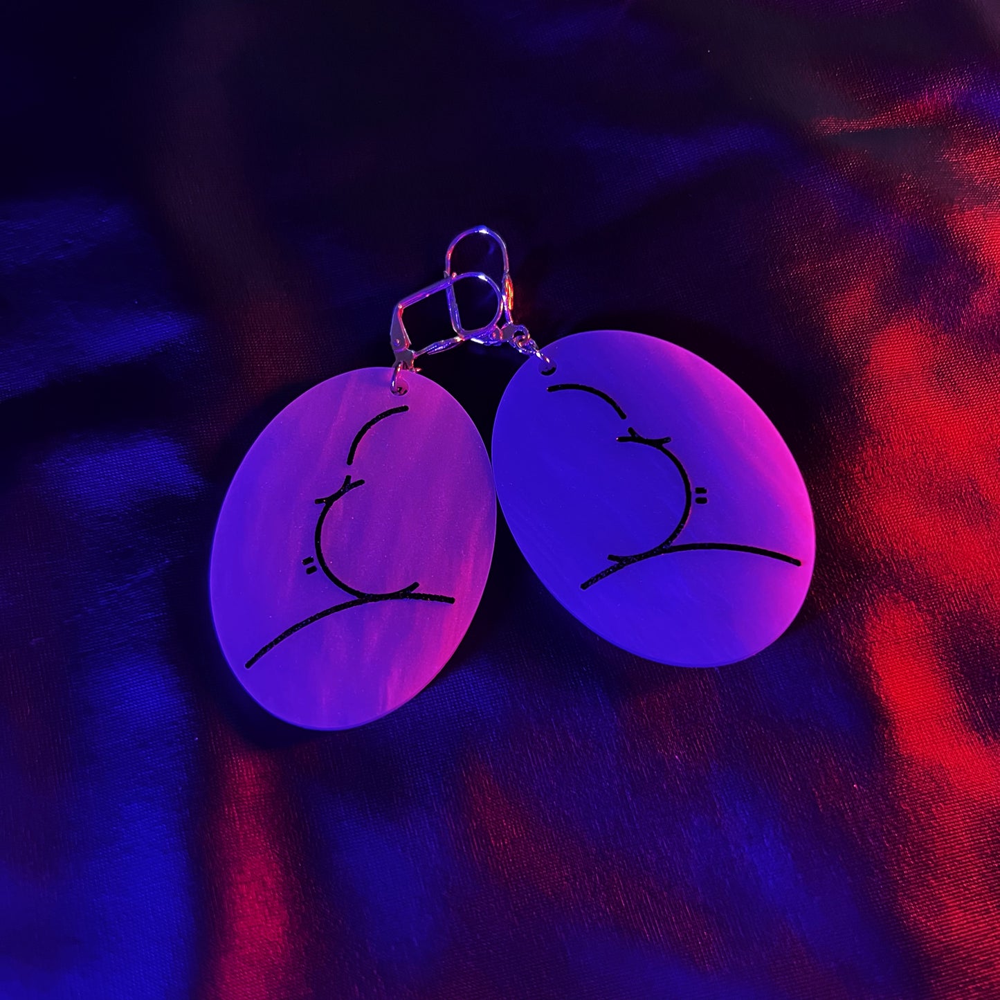 Handmade Alfred Hitchcock silhouette earrings inspired by classic film.