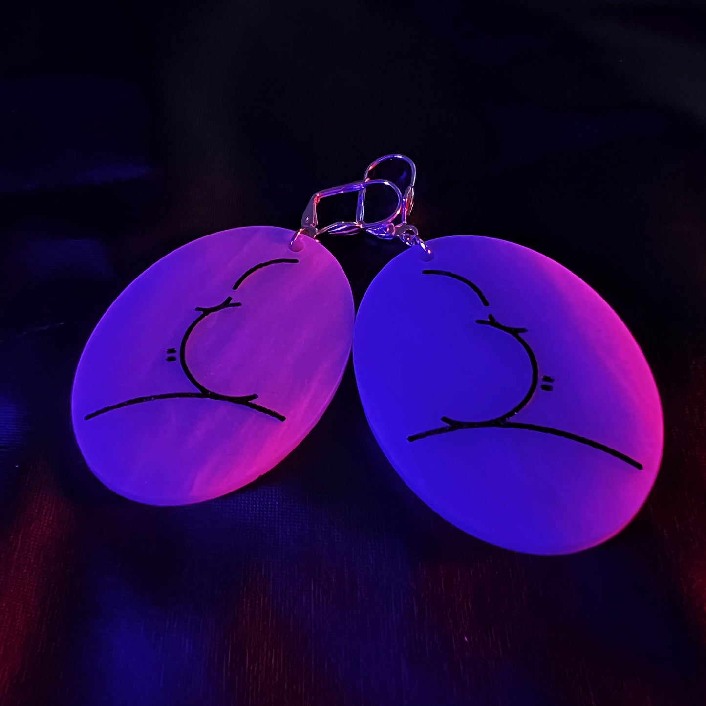 Handmade Alfred Hitchcock silhouette earrings inspired by classic film.