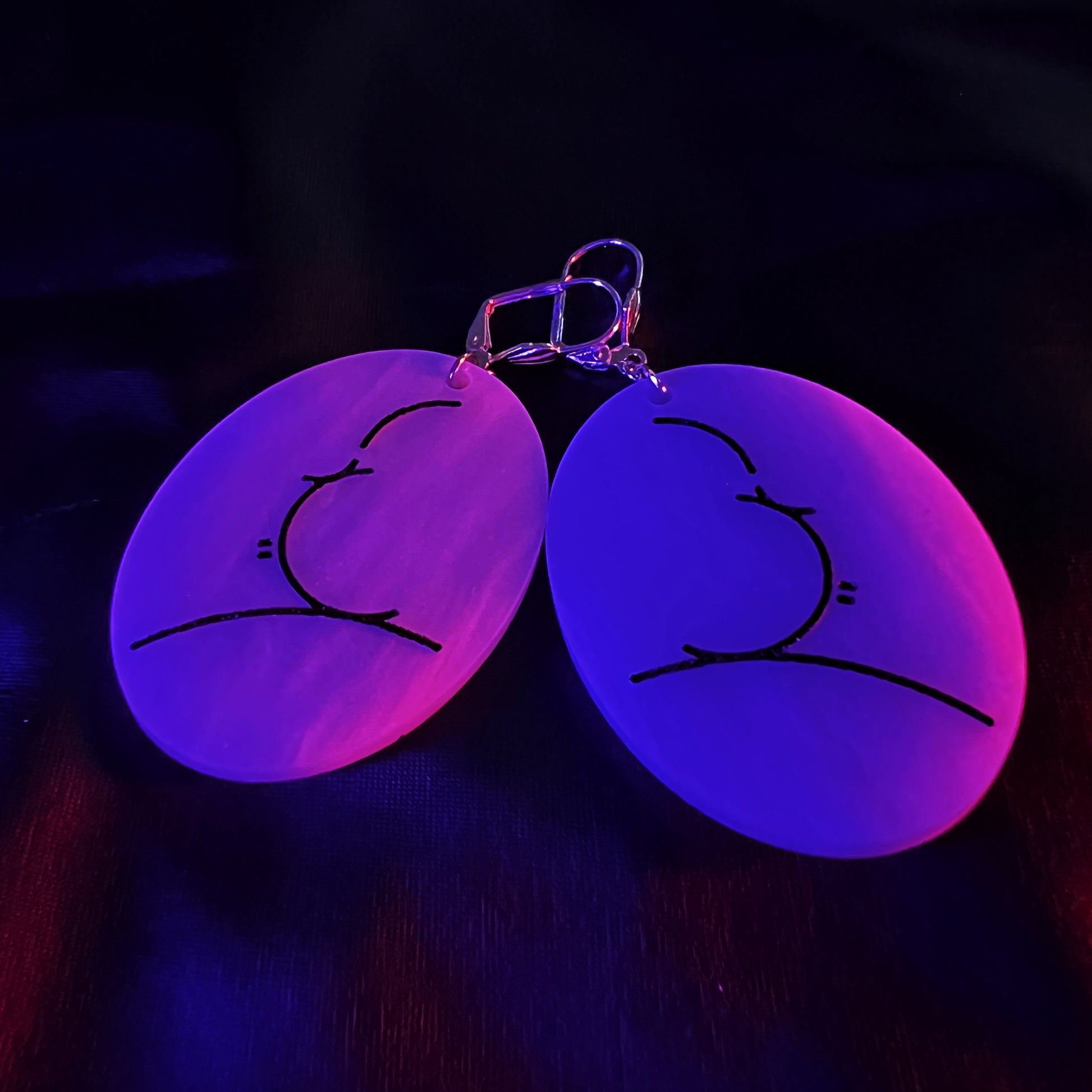 Handmade Alfred Hitchcock silhouette earrings inspired by classic film.