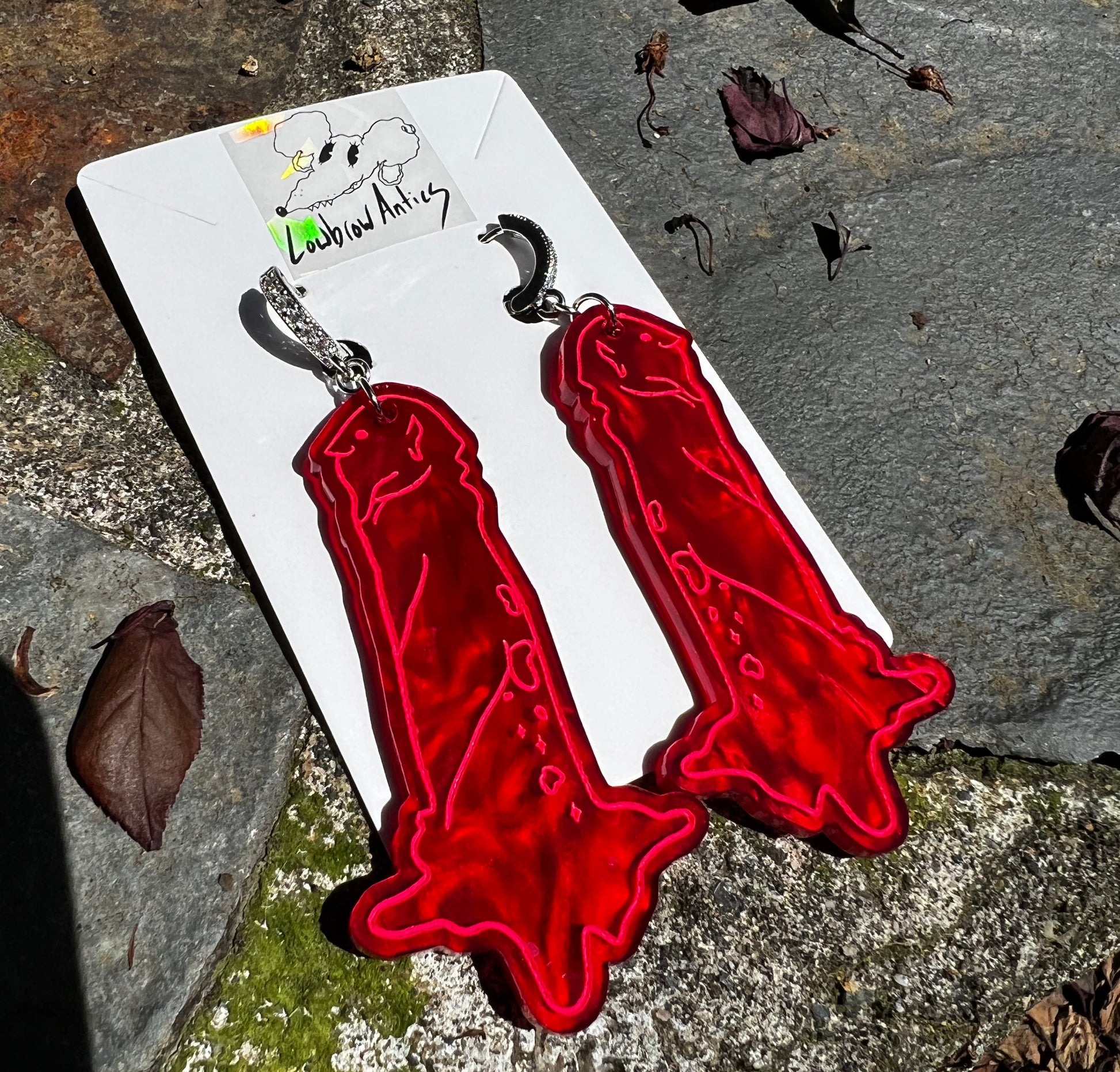 Handmade devil earrings inspired by Belladonna of Sadness.