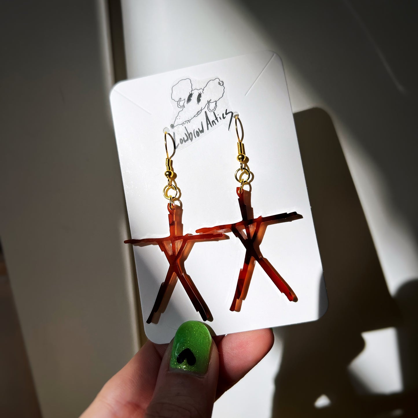 Handmade Twana symbol earrings inspired by The Blair Witch Project.