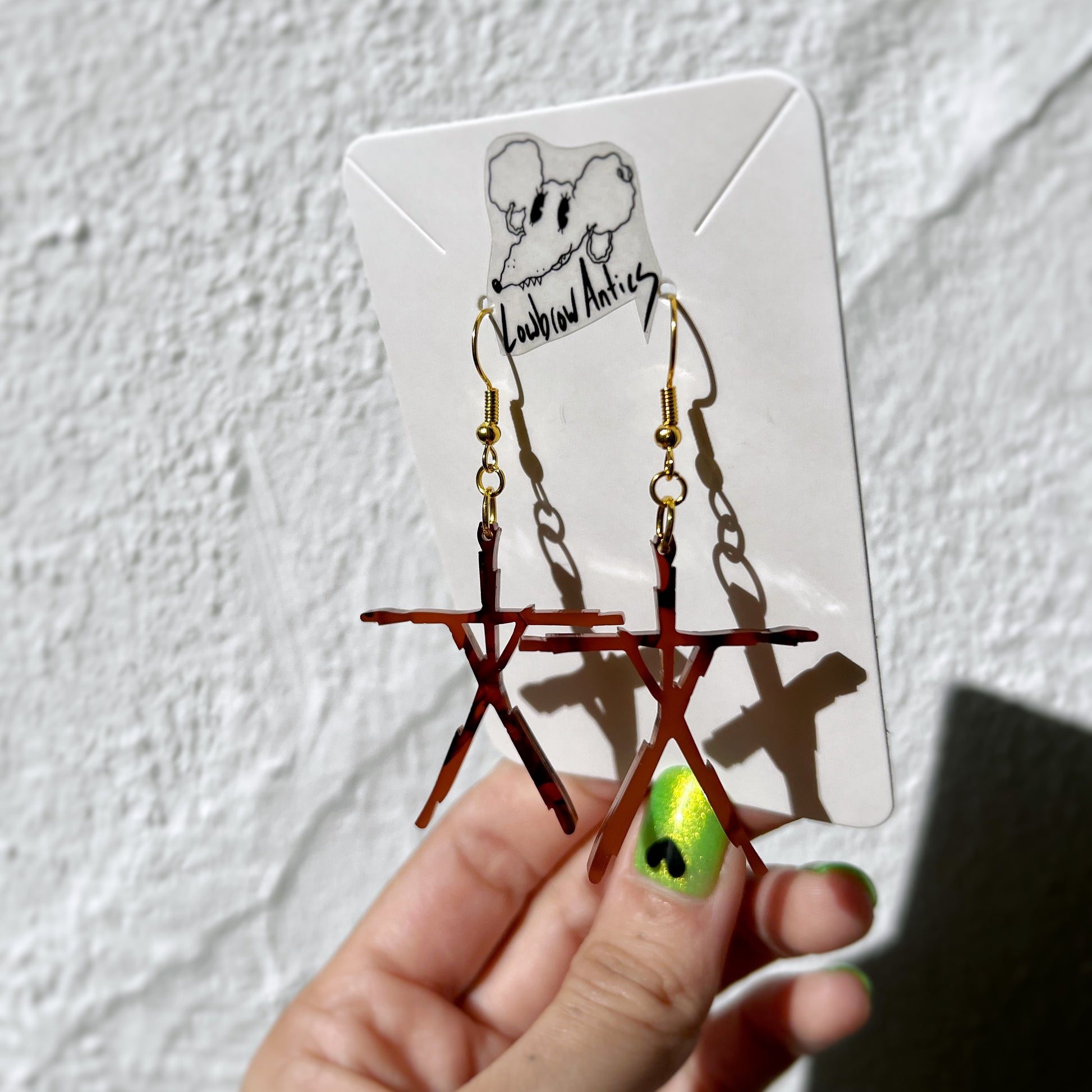 Handmade Twana symbol earrings inspired by The Blair Witch Project.