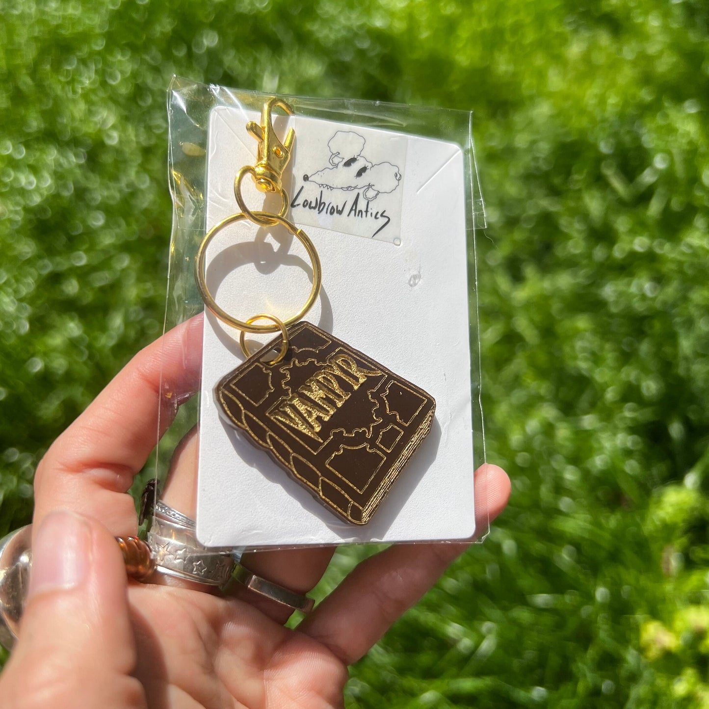 Buffy the Vampire Slayer Vampyr tome earrings and keychains handmade for cult TV fans.