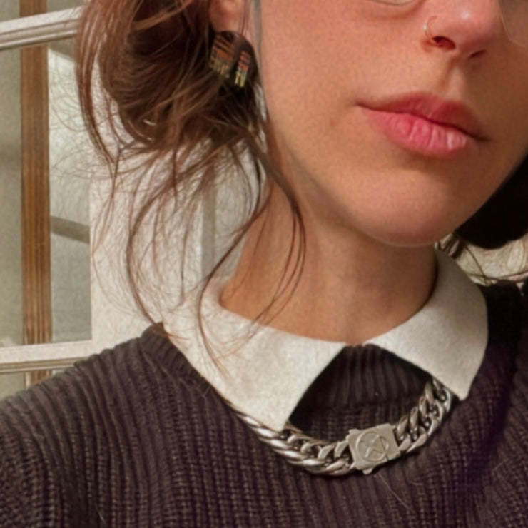 Civic TV Videodrome-inspired handmade pins and earrings for cult film fans.