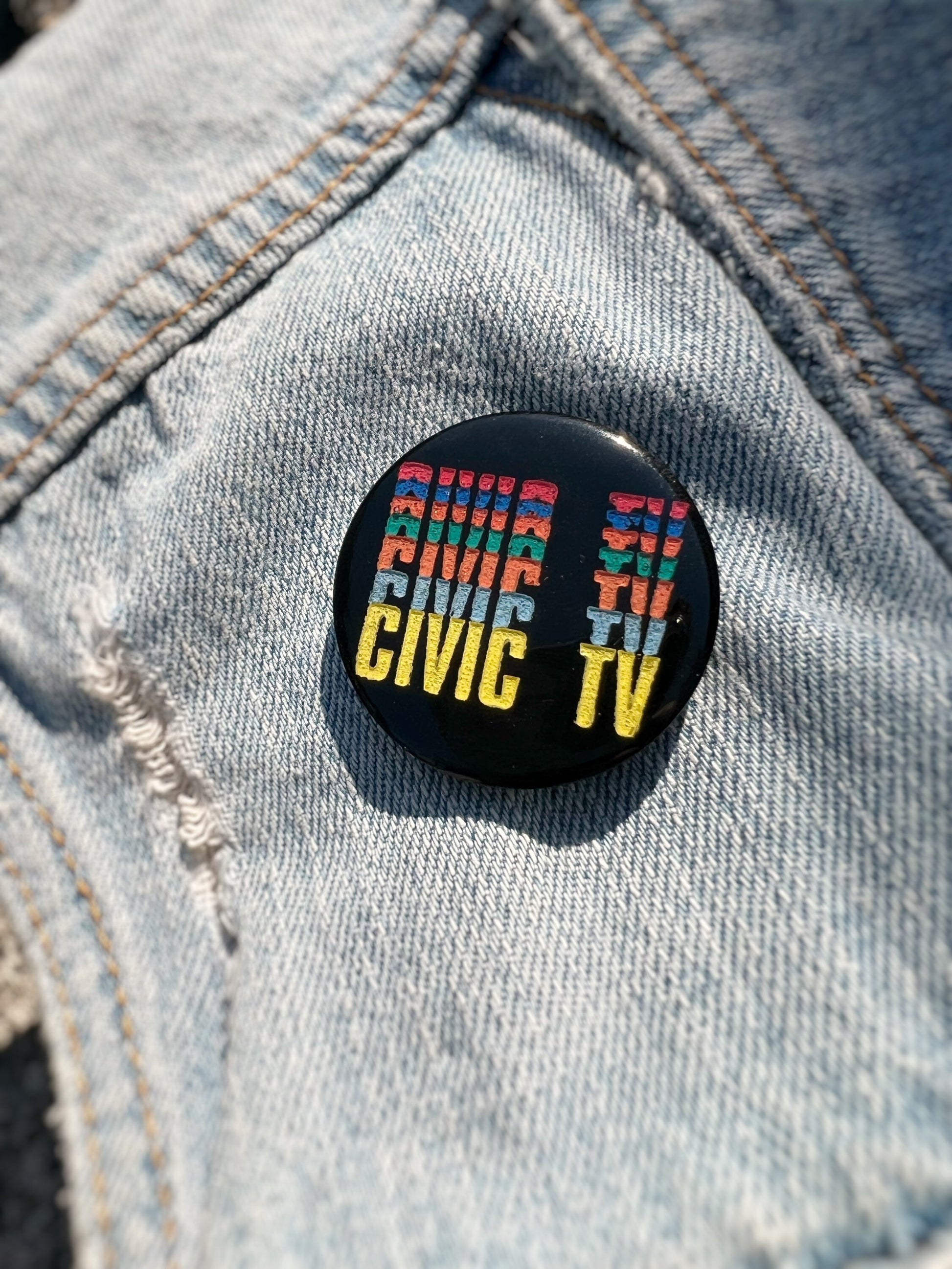 Civic TV Videodrome-inspired handmade pins and earrings for cult film fans.