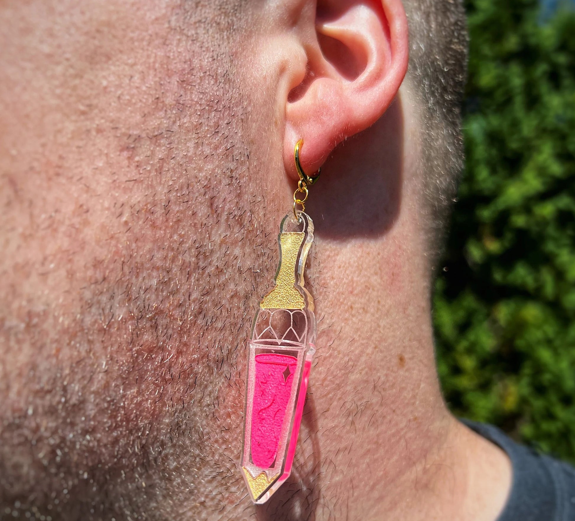 Handmade Death Becomes Her Youthful Tonic-inspired earrings.