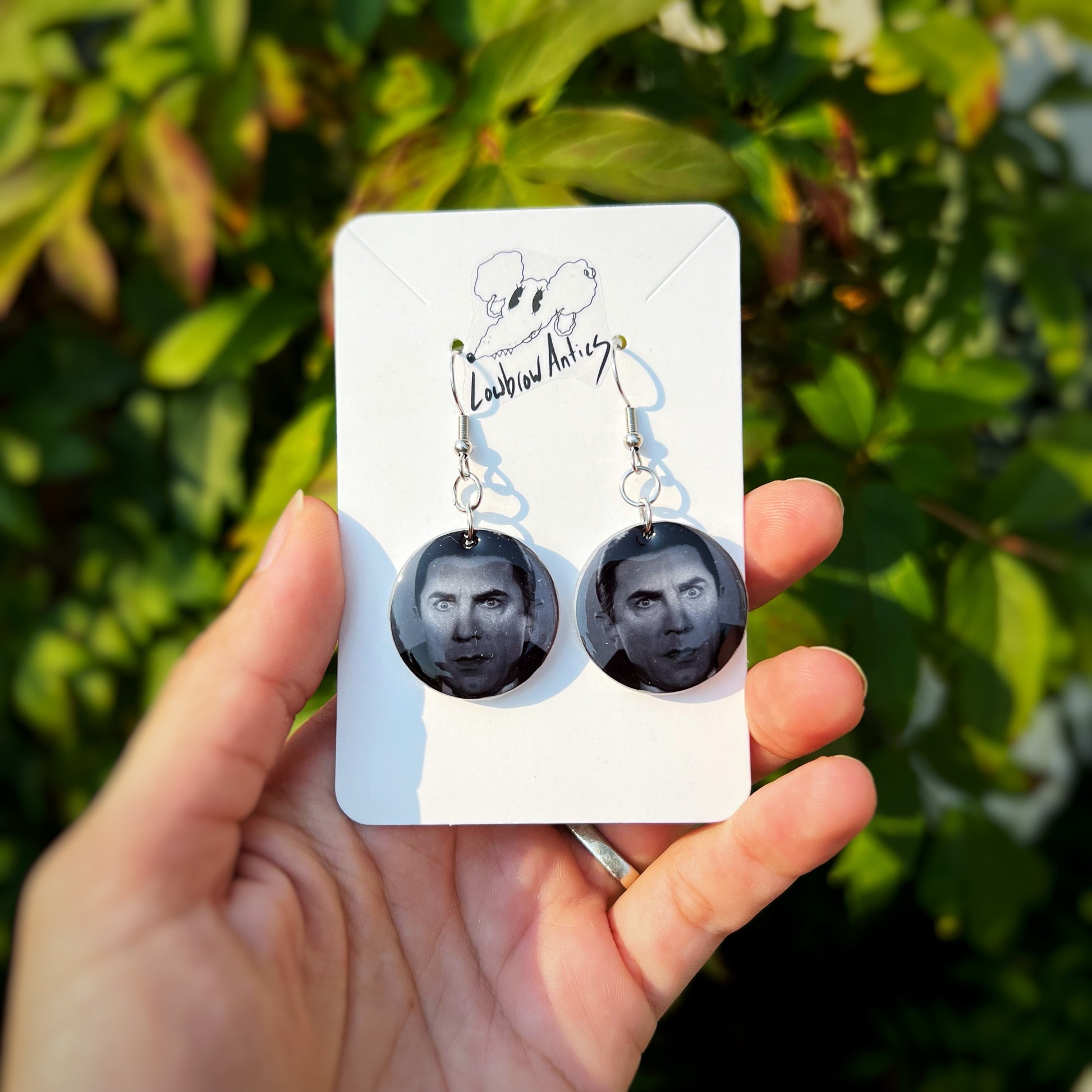 Handmade Dracula black and white earrings inspired by vintage horror movies.