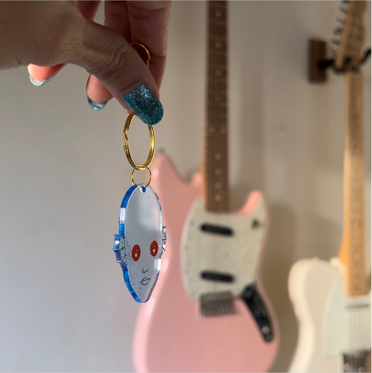 Handmade blacklight keychains inspired by the cult classic Fantastic Planet.