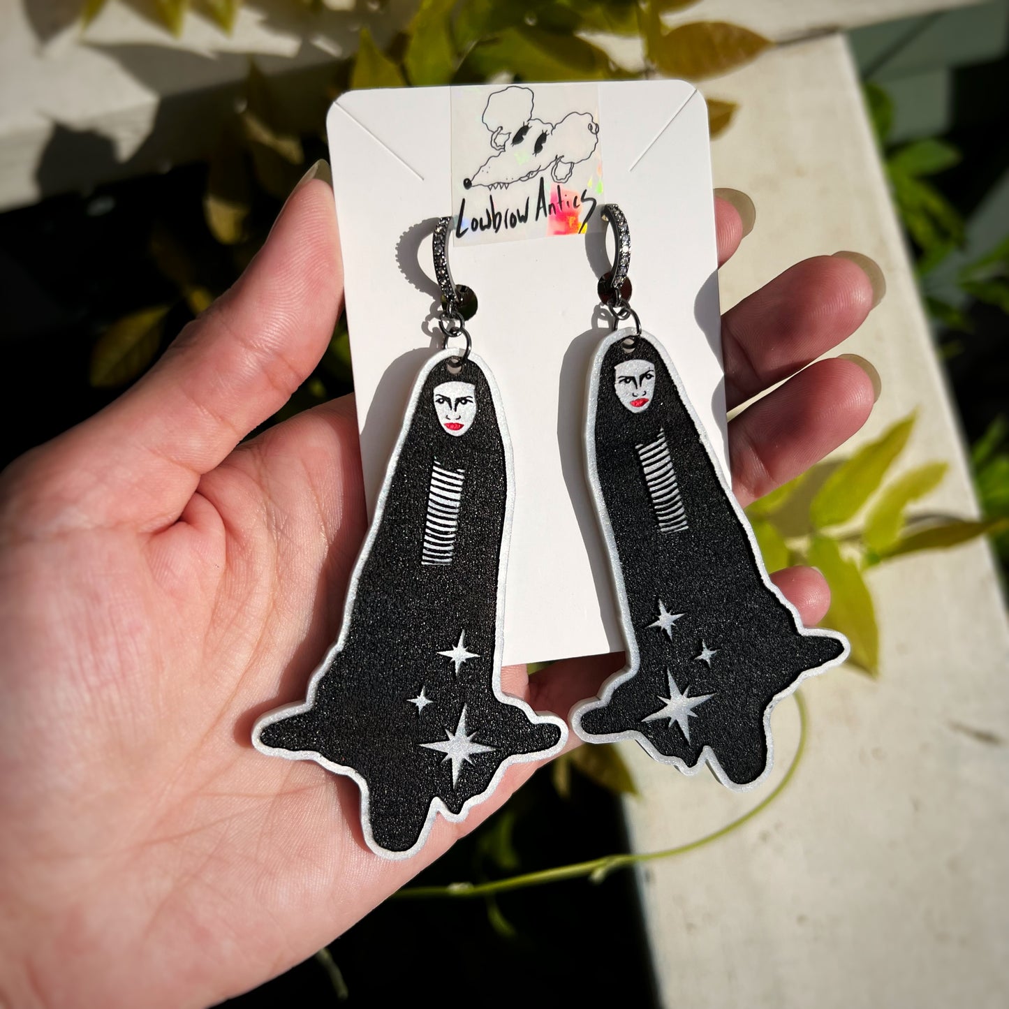 Handmade earrings inspired by A Girl Walks Home Alone at Night.