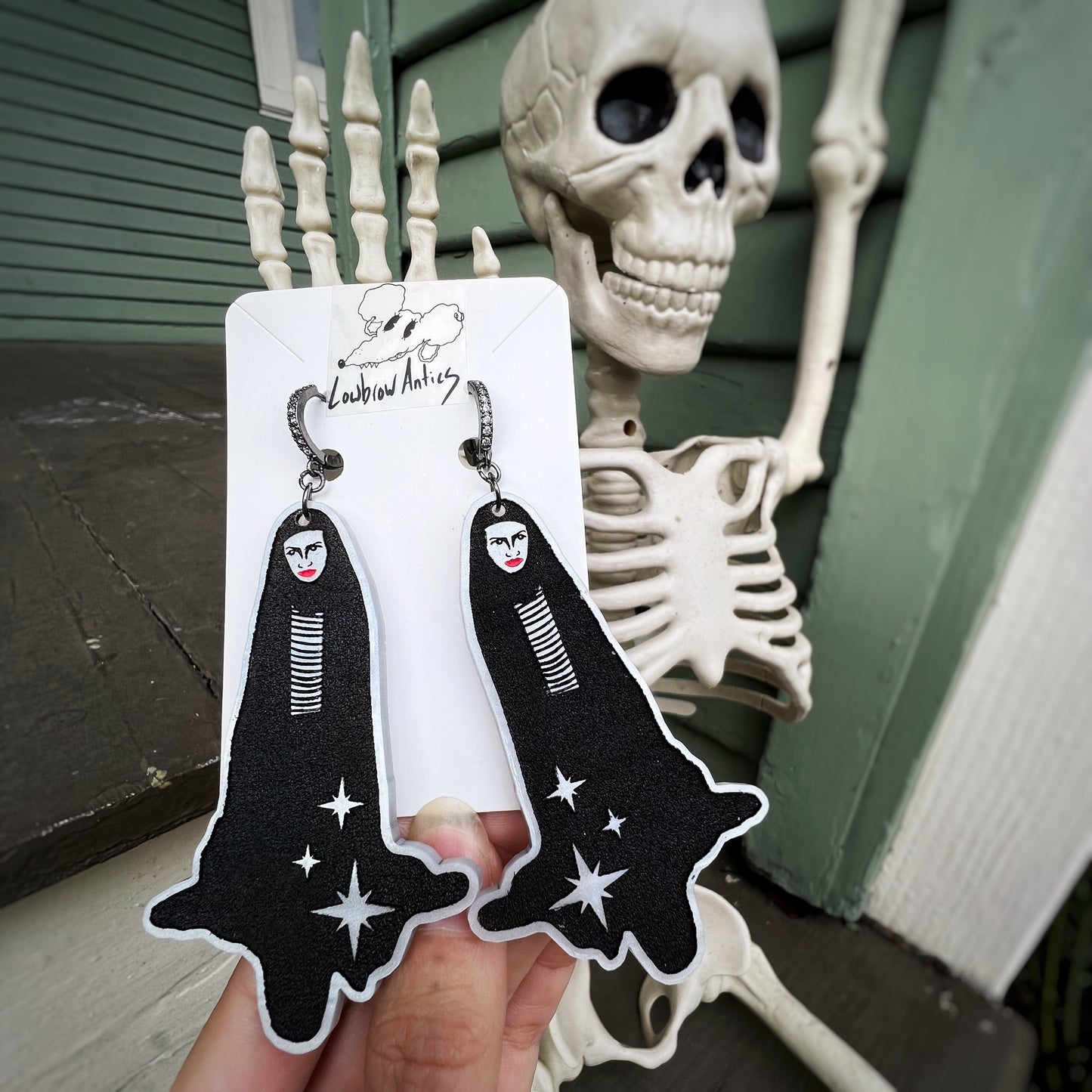 Handmade earrings inspired by A Girl Walks Home Alone at Night.