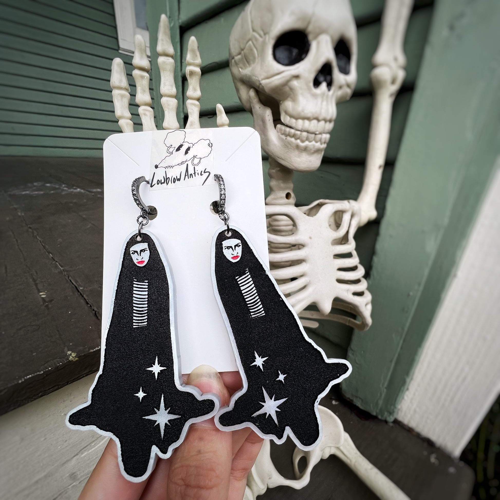 Handmade earrings inspired by A Girl Walks Home Alone at Night.