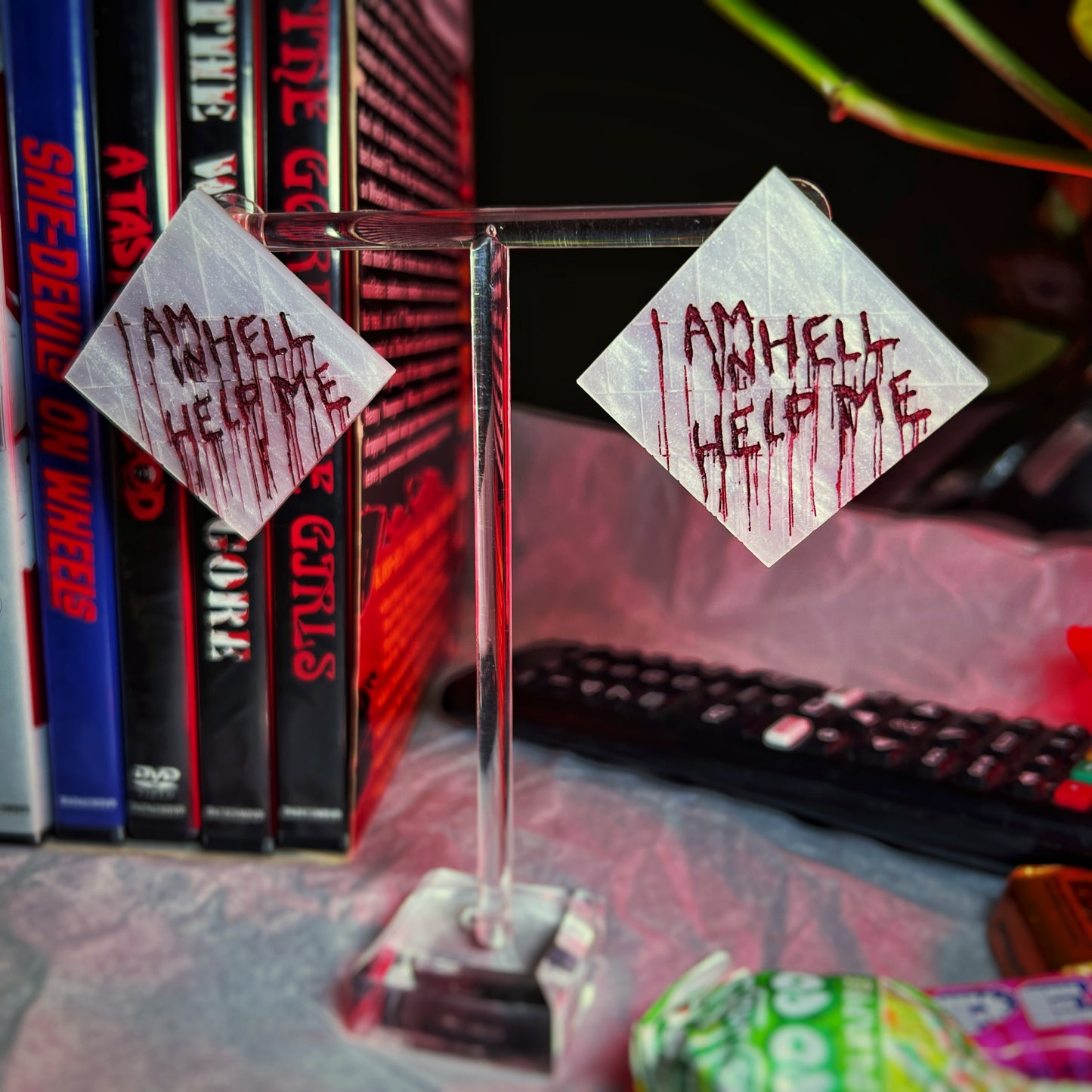 Hellraiser-inspired 'Help Me, I Am in Hell' pin or earring set – perfect horror accessories for fans of Clive Barker's classic.