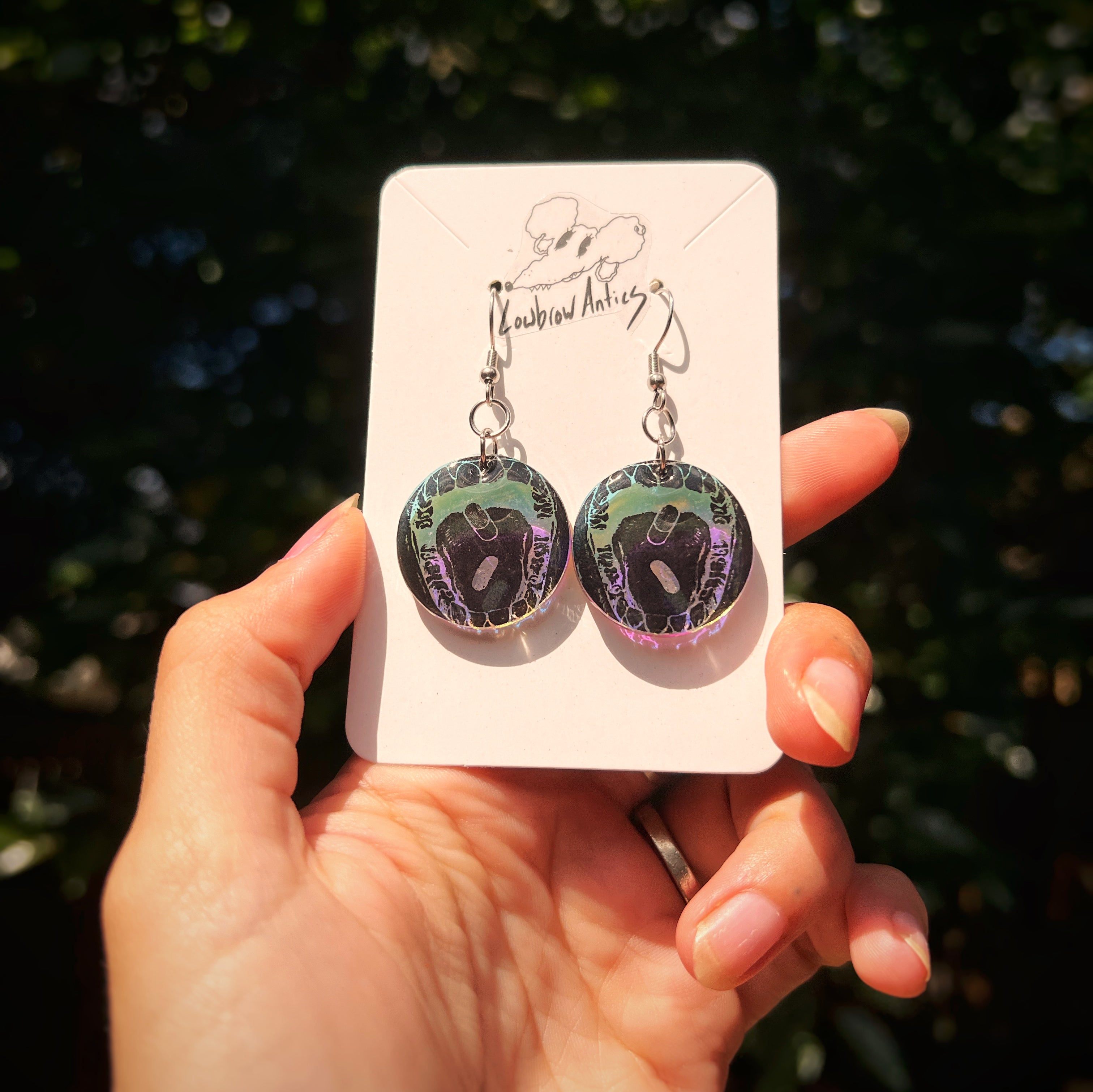 Antics earrings discount