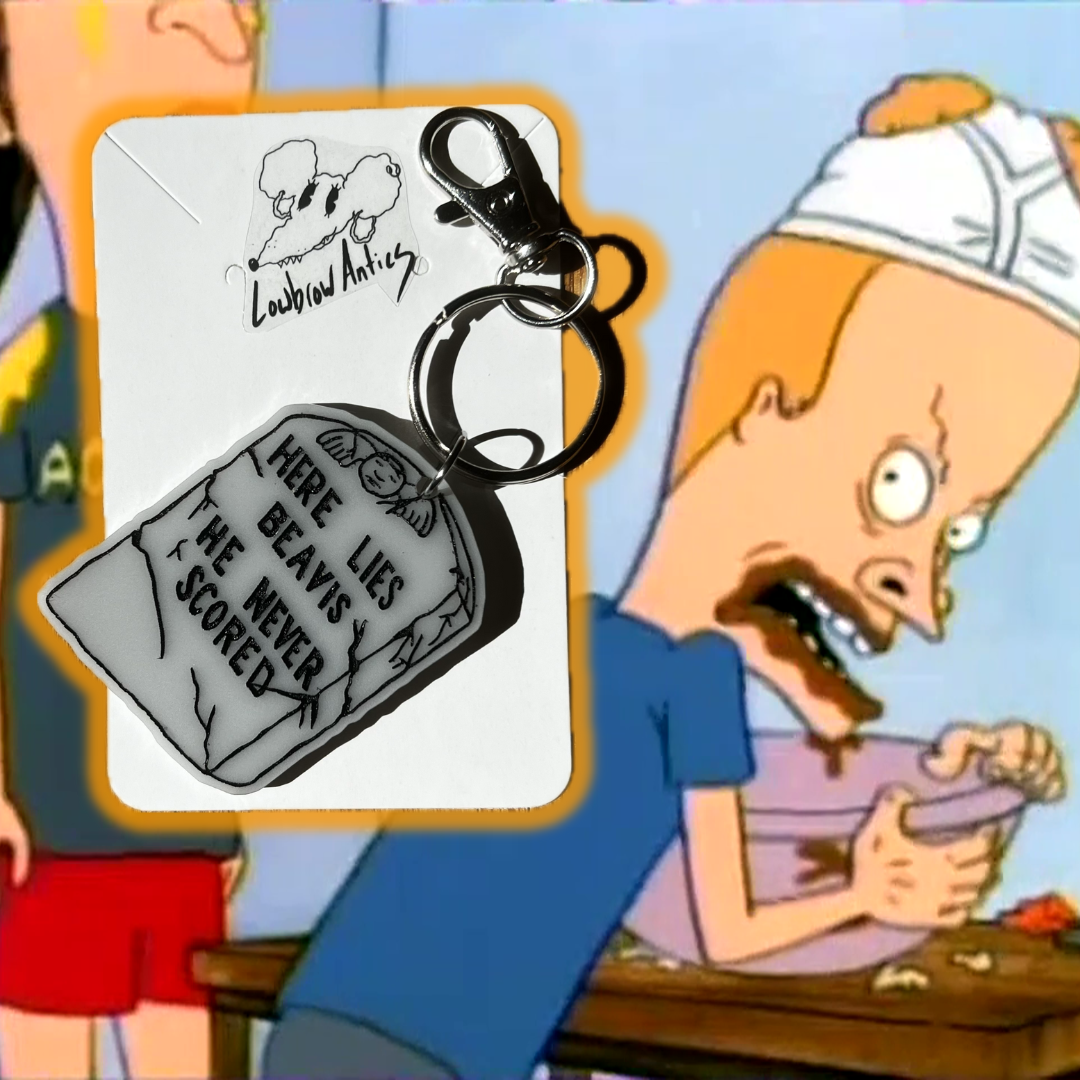 Here Lies Beavis earrings & keychains – Beavis and Butt-Head inspired 90s nostalgia jewelry & accessories.