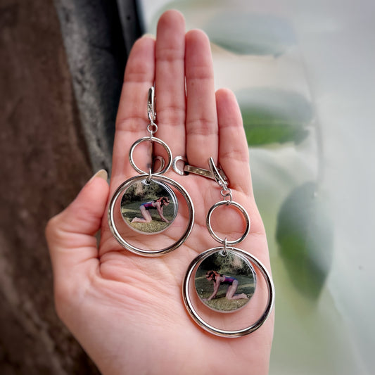 Handmade Dogtooth-inspired double hoop earrings for avant-garde film fans.