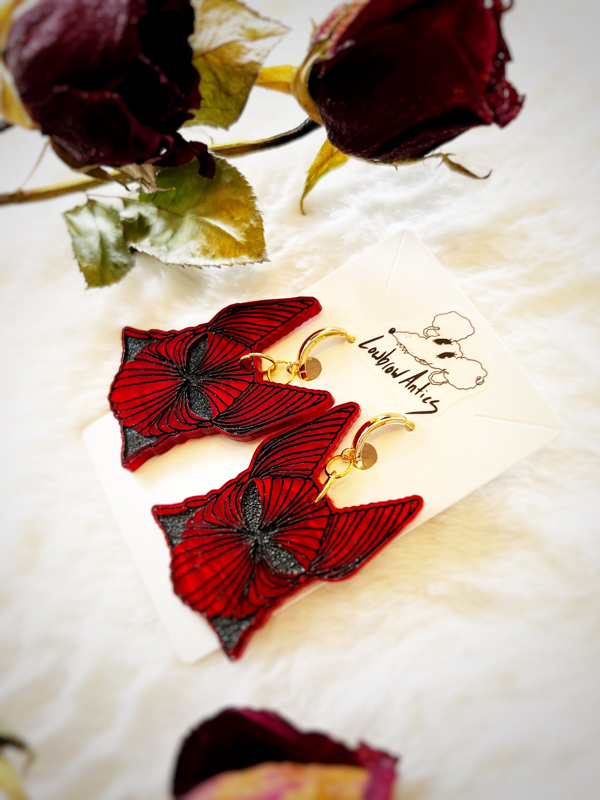 Handmade armor earrings inspired by Bram Stoker’s Dracula.