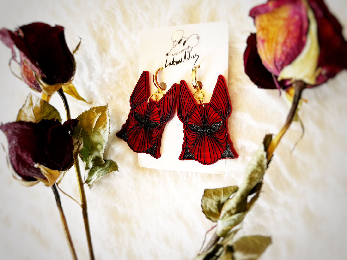 Handmade armor earrings inspired by Bram Stoker’s Dracula.