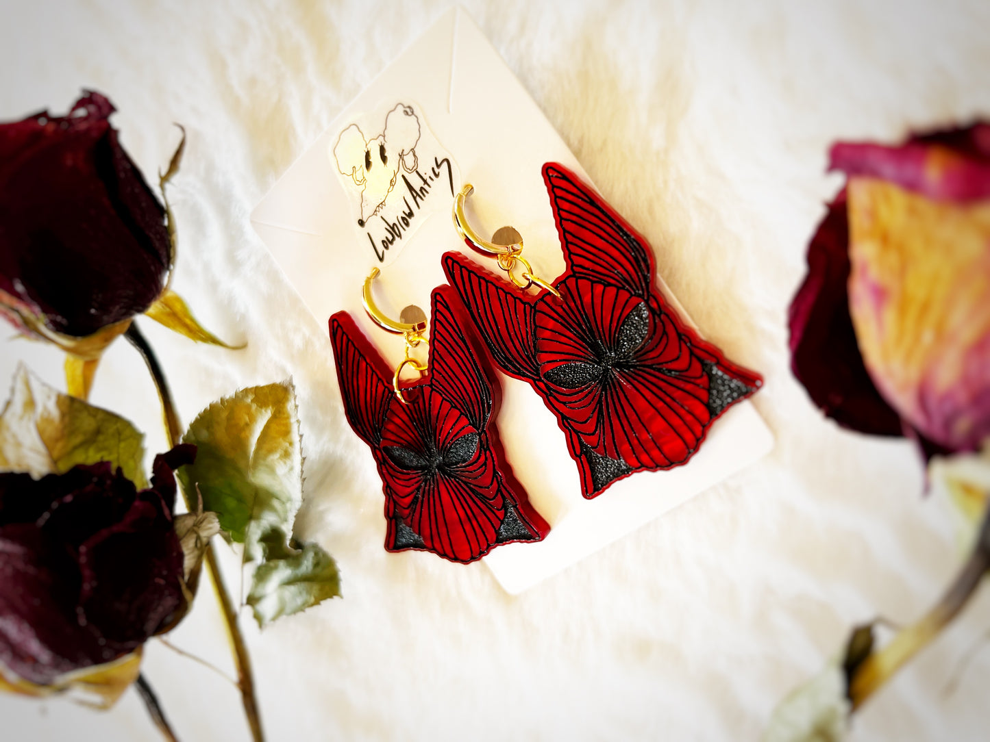 Handmade armor earrings inspired by Bram Stoker’s Dracula.