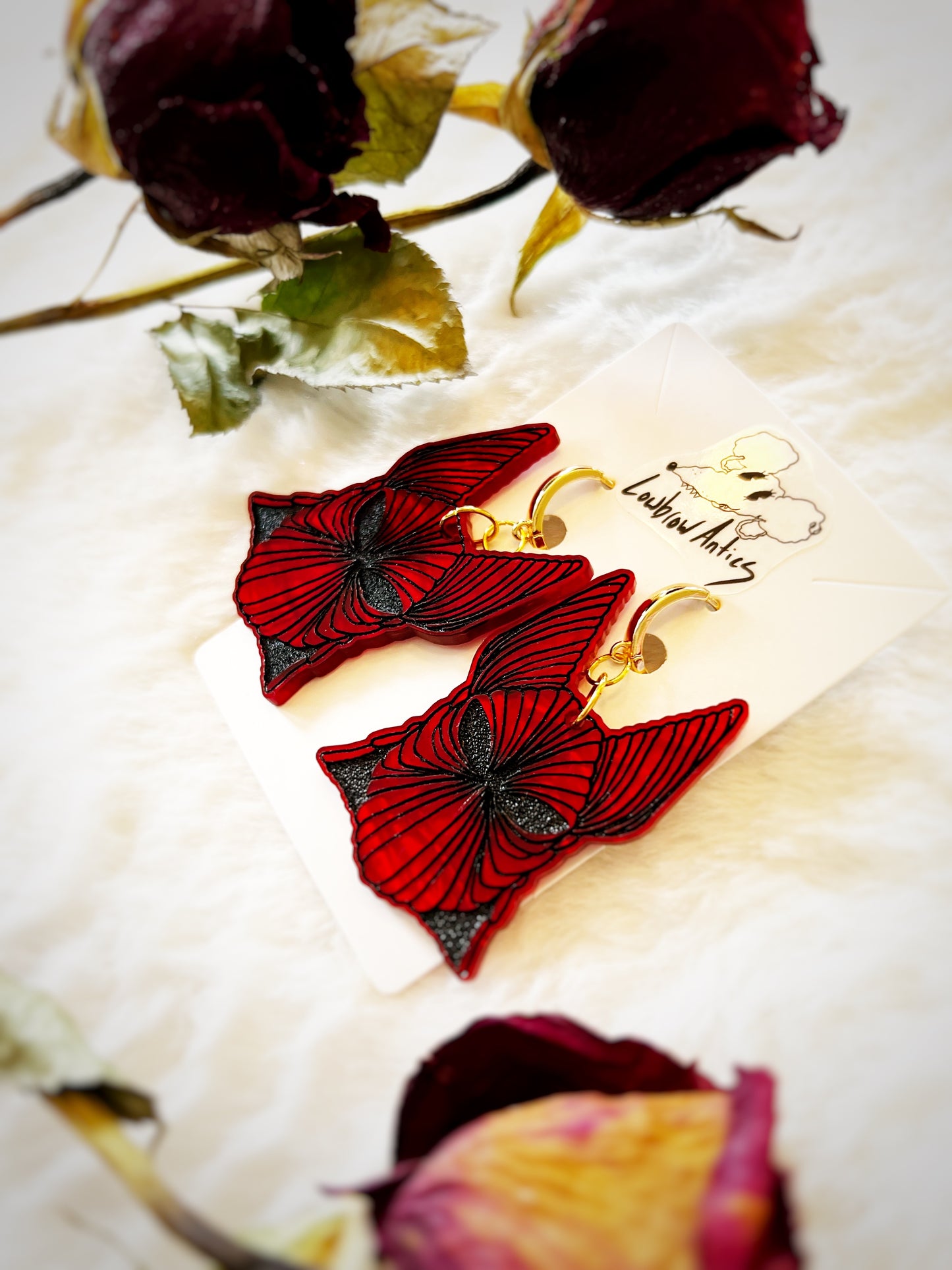 Handmade armor earrings inspired by Bram Stoker’s Dracula.