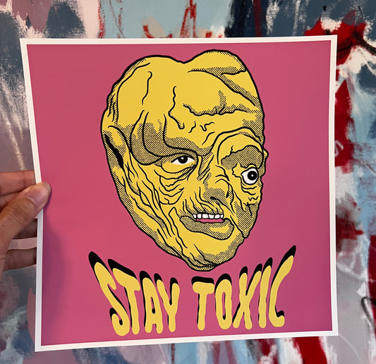 Toxic Avenger Merch - Square Print with bright pink background and neon green illustration of The Toxic Avenger's head, with melting letters below that read "Stay Toxic".
